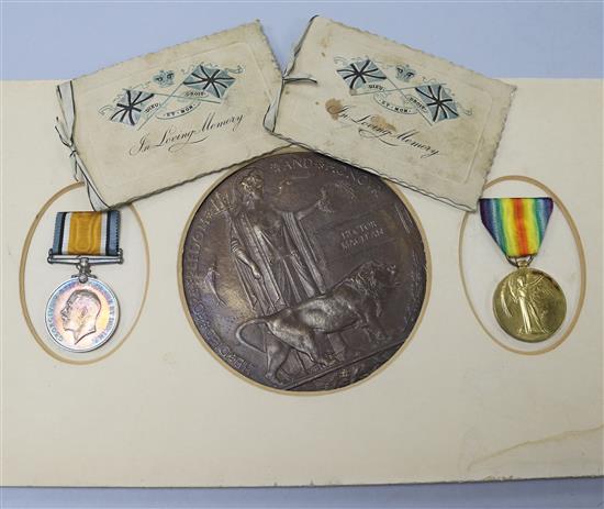 A pair of 1st World War medals and a death plaque to Pvt. H Maclean and two memorium cards with photographs.